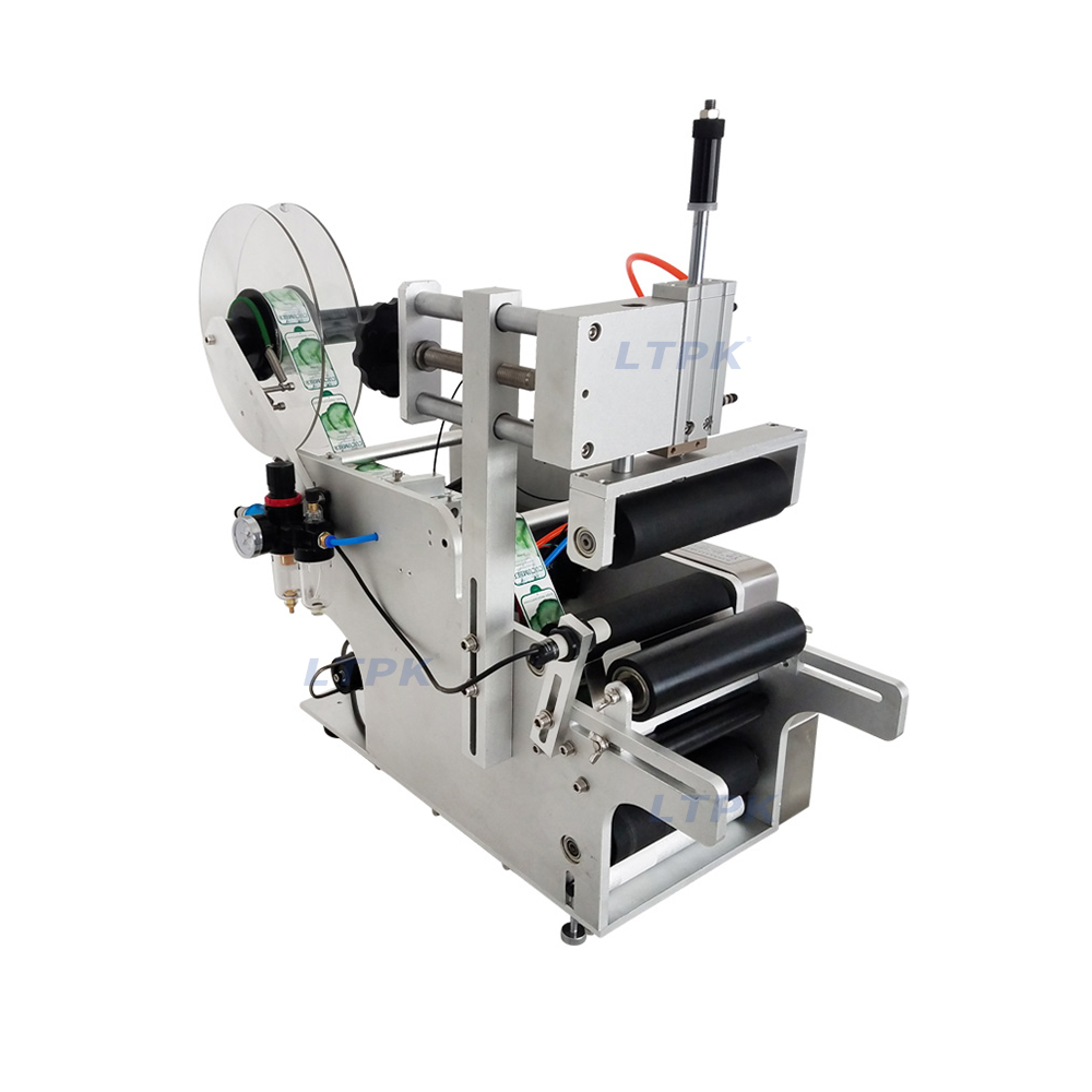 labelling machine for round bottles semi-automatic.jpg